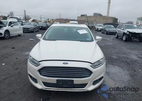 2013 Ford Fusion Hybrid Se z USA, uszkodzony, nr VIN 3FA6P0LU0DR197106